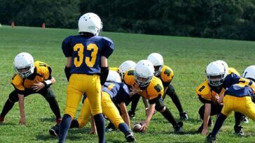 watch:-football-dad,-41,-trips-player,-9,-preventing-him-from-a-touchdown