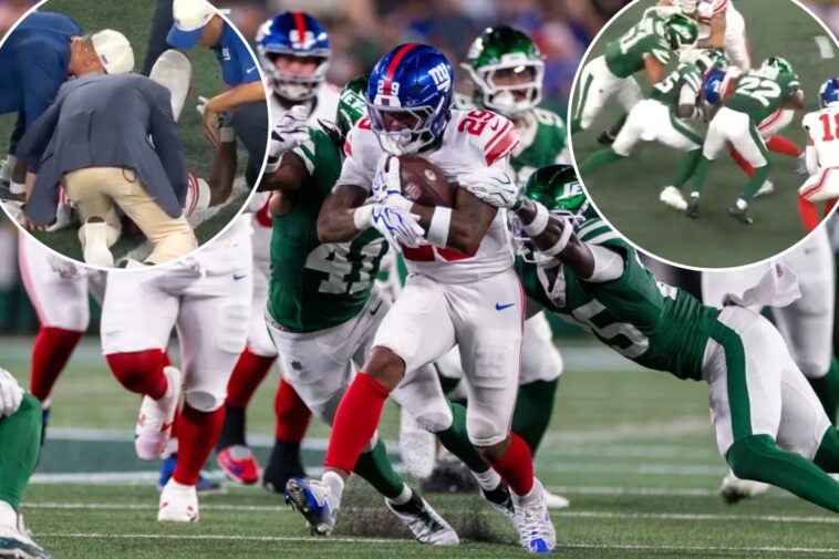 tyrone-tracy-heads-back-to-locker-room-in-potential-giants-injury-scare