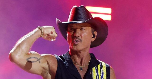 tim-mcgraw-falls-flat-on-his-back-during-cincinnati-concert-after-boot-gets-caught-in-stage-platform