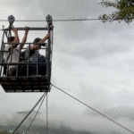rescuers-use-ziplines-to-transport-trapped-citizens-after-devastating-nepal-floods-decimate-country’s-bridges