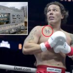 vile-kickboxer-with-ss-tattoo-gives-nazi-salute-after-beating-jewish-fighter-—-as-supporters-hold-swastika-banner