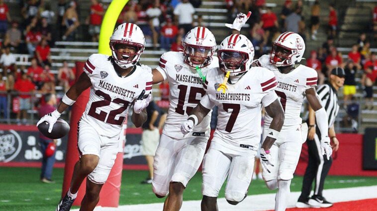 umass-player-absolutely-obliterates-unsuspecting-woman-on-the-sidelines-after-interception