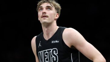 nets-bring-back-7-footer-grant-nelson-on-two-way-deal