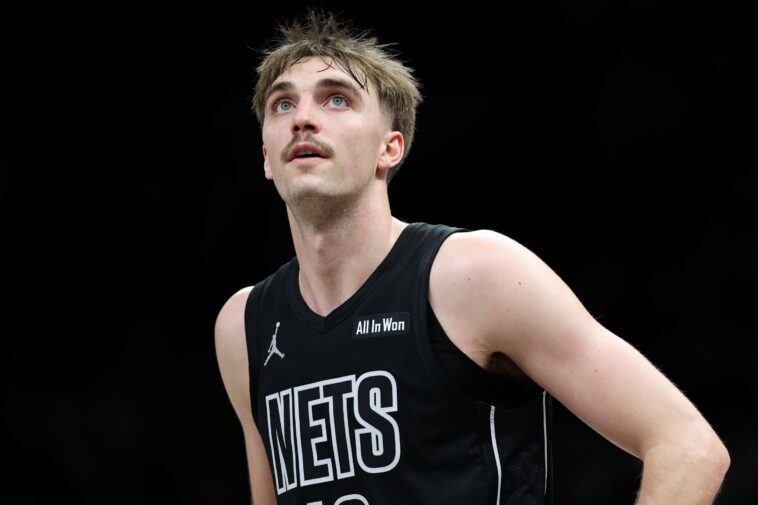 nets-bring-back-7-footer-grant-nelson-on-two-way-deal