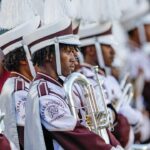 marching-band-tuba-player-unleashes-punches-on-man-at-college-football-game-without-missing-a-beat