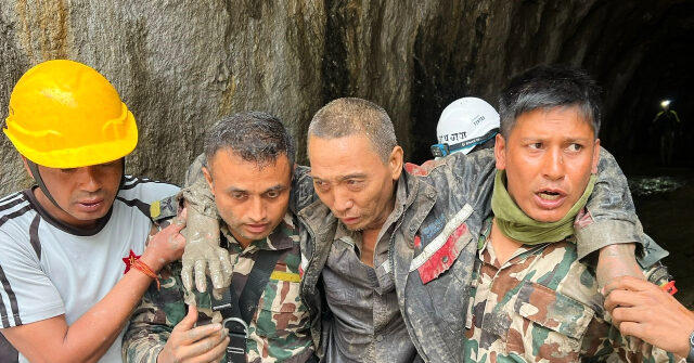 video-—-nepal:-two-people-rescued-10-days-after-being-trapped-by-massive-floods-and-landslides