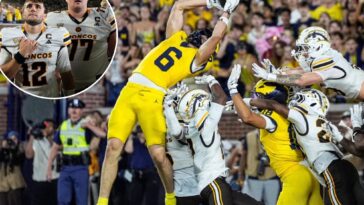 michigan-wins-on-second-hail-mary-pass-in-controversial-ending-to-avoid-brutal-upset