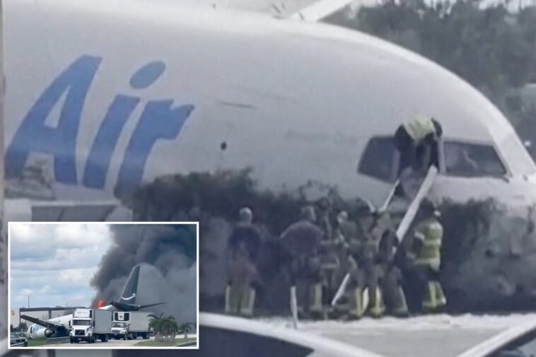 miami-firefighters-seen-climbing-into-amazon-cargo-jet-after-shouting-on-dispatch-‘the-plane-is-on-fire’