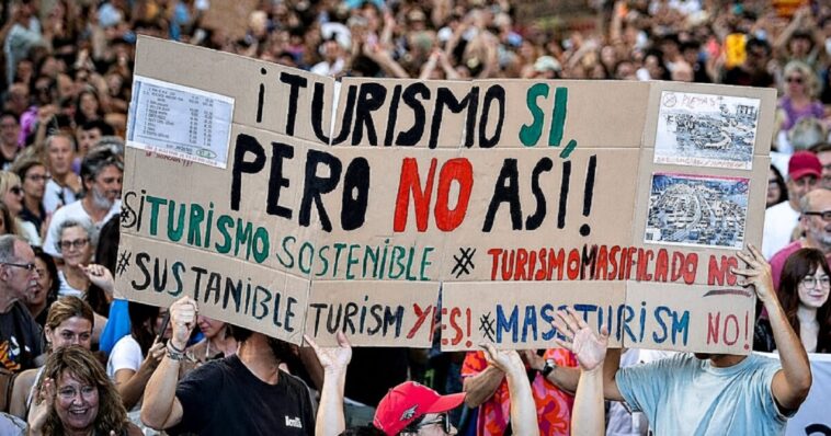 ibiza-locals-move-on-world-famous-beach-to-protest-overtourism-destroying-their-island’s-quality-of-life