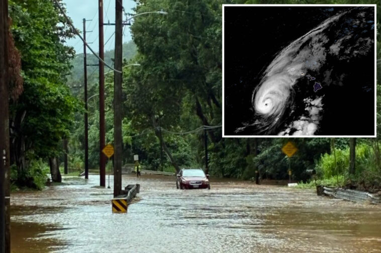life-threatening-hurricane-lowell-makes-rare-direct-hit-on-hawaii-as-intense-rain,-wind-blast-state