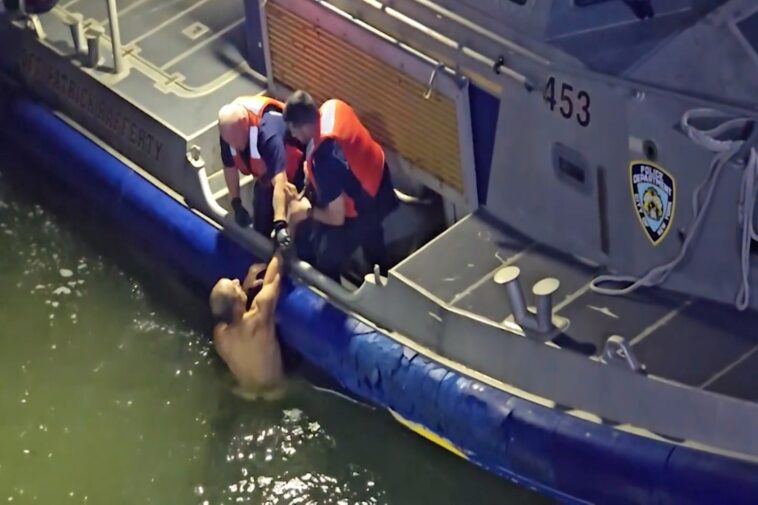 dramatic-video-shows-naked-man-being-pulled-from-east-river-by-nyc-cops