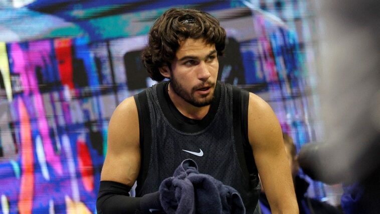 tennis-star-carlos-alcaraz-vomits-in-towel-during-us-open-thriller-after-trying-to-shoo-cameras-away