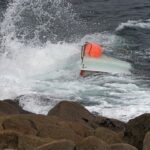 teen-boater-found-clinging-to-capsized-vessel-after-3-go-missing;-2-bodies-recovered
