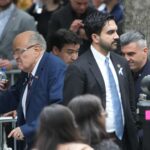 lipreader-reveals-what-giuliani-said-to-zohran-mamdani-in-awkward-exchange-at-9/11-ceremony