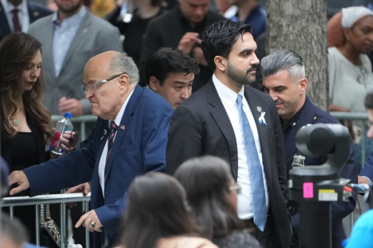 lipreader-reveals-what-giuliani-said-to-zohran-mamdani-in-awkward-exchange-at-9/11-ceremony