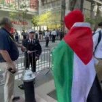 firefighter-caught-on-camera-ripping-pro-palestinian-agitator-in-elmo-costume-near-ground-zero-on-9/11