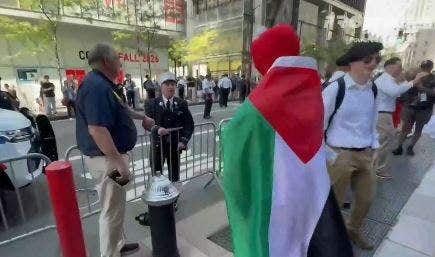 firefighter-caught-on-camera-ripping-pro-palestinian-agitator-in-elmo-costume-near-ground-zero-on-9/11