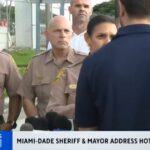 hot-mic:-sheriff-and-miami-mayor-fight-over-who-is-going-to-speak-first-at-amazon-plane-crash-presser-(video)