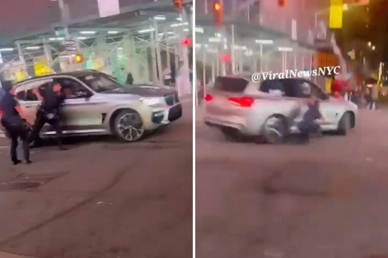 shocking-video-shows-wrong-way-bmw-racing-off,-hurling-armed-cop-to-ground-in-times-square