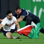sick:-at-9:11-pm-on-25th-anniversary-of-9/11,-man-runs-on-field-at-yankee-stadium-with-palestinian-flag