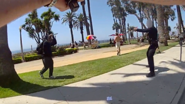 knife-wielding-man-races-at-officer-in-packed-seaside-park-before-one-deadly-shot-rings-out:-video