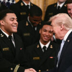 watch:-navy-grad-landon-robinson-wears-formal-service-uniform-to-nfl-debut