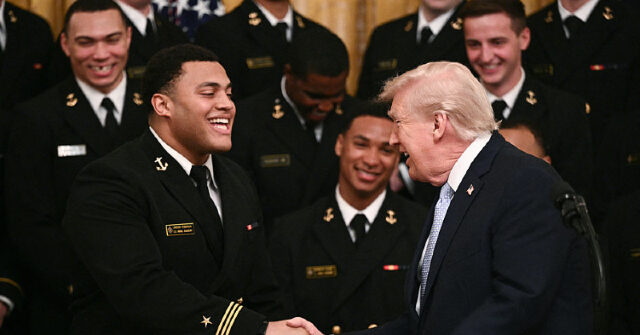 watch:-navy-grad-landon-robinson-wears-formal-service-uniform-to-nfl-debut