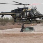 arizona-sheriff-deploys-helicopter-to-save-2-stranded-in-flooded-car