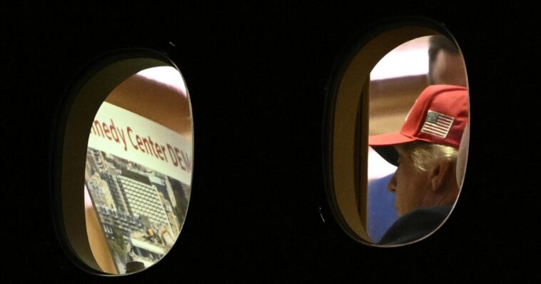 zoomed-in-photo-of-trump-reading-document-on-air-force-one-ignites-speculation-about-future-of-kennedy-center
