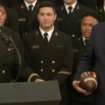 naval-academy-graduate-landon-robinson-goes-viral-for-wearing-his-marine-dress-blues-to-first-nfl-game-(video)