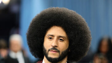 adam-carolla-accuses-‘race-hustler’-colin-kaepernick-of-growing-’26-foot-afro’-to-seem-more-black