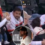 giants-‘mom-of-the-year’-broadcast-moment-goes-viral-because-of-lazy-man-beside-her:-‘smack-him!’