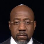 raphael-warnock:-trump-‘doesn’t-believe-in-america’