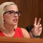 kyrsten-sinema’s-ex-bodyguard-gave-her-an-ultimatum-then-her-paintings-ended-up-in-the-pool.