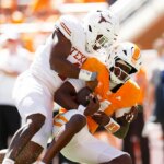 no.-1-texas-escapes-tennessee-with-thrilling-sec-victory-as-president-trump-watches-on-from-neyland-stadium