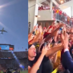 watch:-trump-buzzes-over-university-of-tennessee-football-stadium-on-air-force-one,-high-fives-fans-in-roaring-crowd