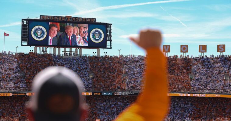 applause-erupts-as-crowd-of-over-100,000-sees-trump-on-the-jumbotron-at-major-sec-showdown