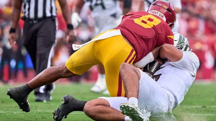 usc-linebacker-suspended-after-vicious-hit-on-oregon-quarterback-dante-moore