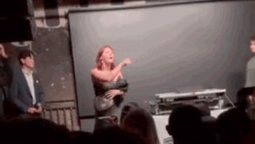 protester-storms-dc-party,-flips-off-crowd-as-‘usa!’-chants-erupt-amid-trump’s-ai-push
