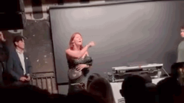protester-storms-dc-party,-flips-off-crowd-as-‘usa!’-chants-erupt-amid-trump’s-ai-push