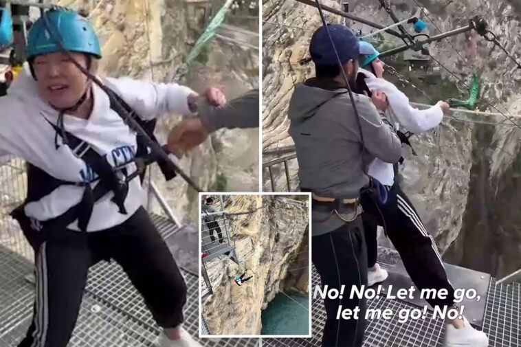shocking-moment-staffers-kick-terrified-woman’s-legs-away-to-make-her-take-260-foot-thrill-jump