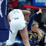 watch:-enraged-ex-wnba-player-restrained-from-going-after-fan-during-wild-confrontation