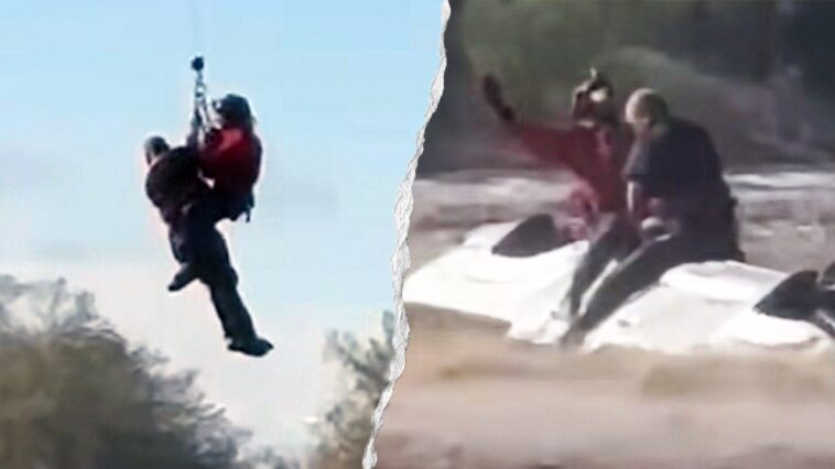 arizona-sheriff’s-helicopter-crew-rescues-man-stranded-atop-overturned-truck-in-rapidly-rising-floodwaters