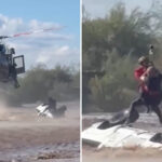 arizona-sheriff’s-helicopter-crew-rescues-man-stranded-atop-overturned-truck-in-rapidly-rising-floodwaters