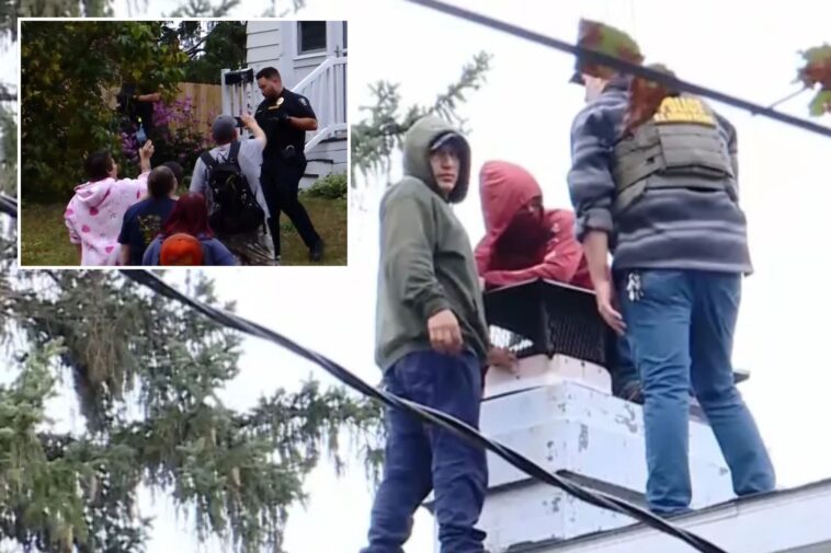angry-ny-mob-sneaks-border-patrol-fugitives-off-roof-during-wild-7-hour-standoff