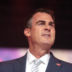 ok-gov.-stitt:-feds-should-avoid-immigration-enforcement-at-worksites,-it’s-raising-beef-prices