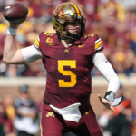minnesota-quarterback-gets-kicked-in-the-crotch-by-teammate-en-route-to-upset-win-over-michigan