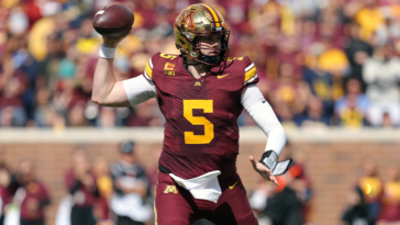 minnesota-quarterback-gets-kicked-in-the-crotch-by-teammate-en-route-to-upset-win-over-michigan