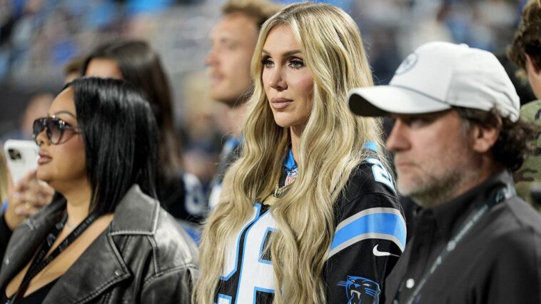 wwe-star-charlotte-flair-struts-into-panthers’-stadium,-bangs-the-drum-before-game-vs-lions