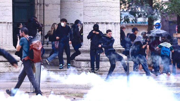 teen’s-hand-blown-off-by-police-grenade-during-french-student-protests:-report